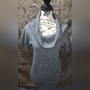 Scoop neck sweater.